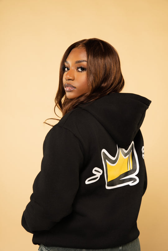 Woman wearing satin lined hoodie to protect natural hair