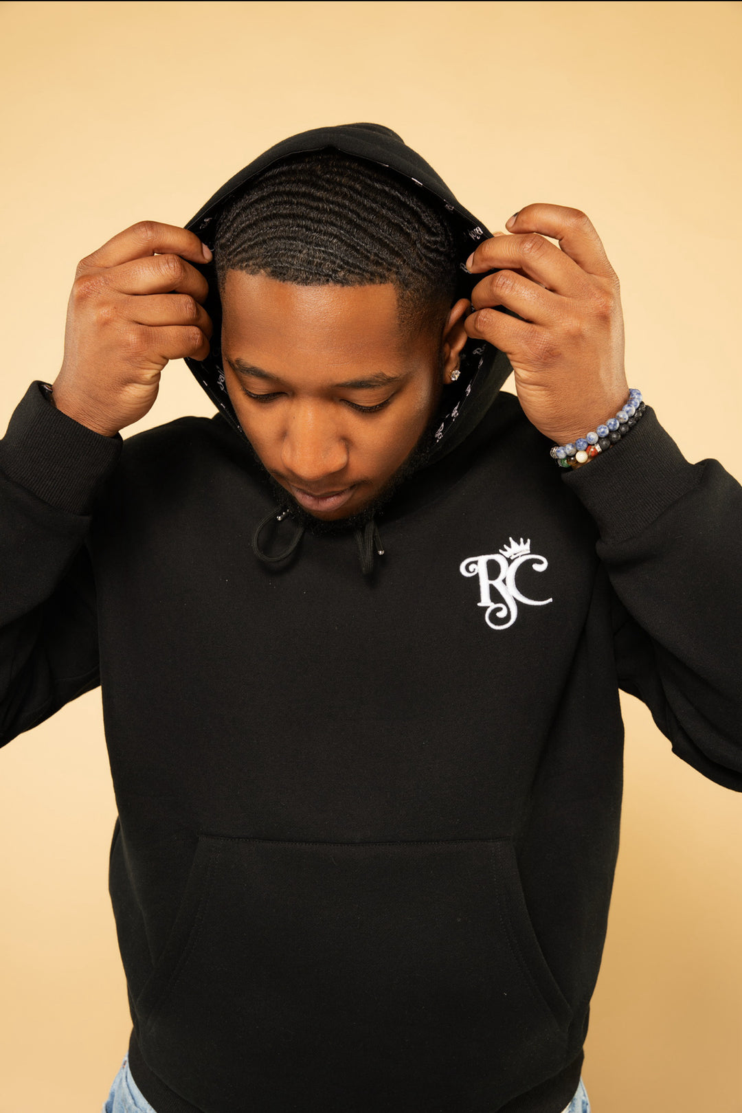 Man wearing satin lined hoodie to protect 360 waves