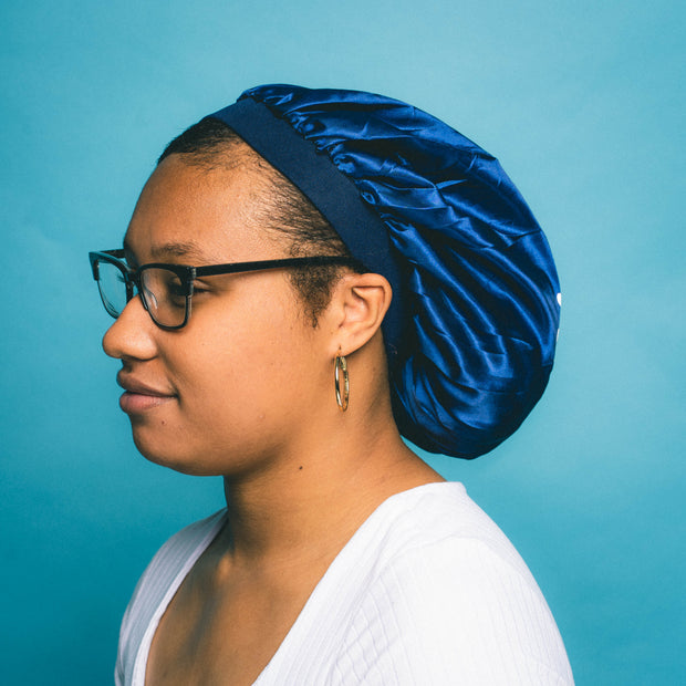 side view of navy blue double satin bonnet