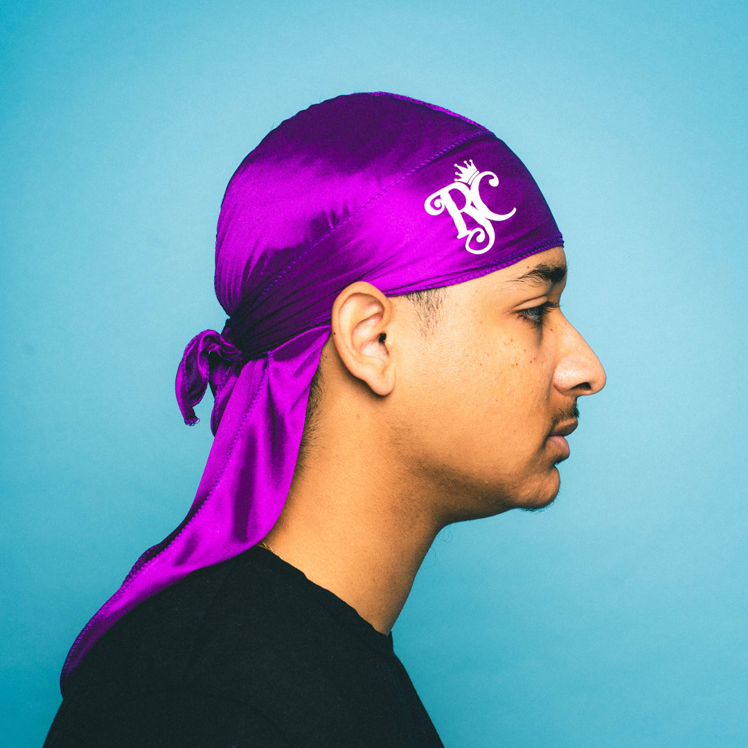 side view of purple royal crown silk durag