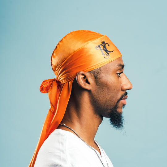 side view of orange royal crown silky durag
